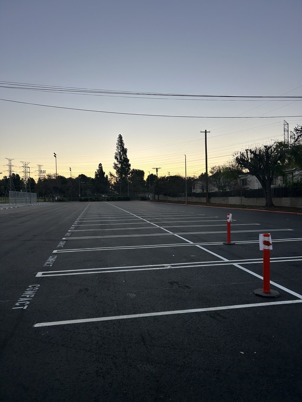 fresh parking lot striping and compact stalls in Riverside CA